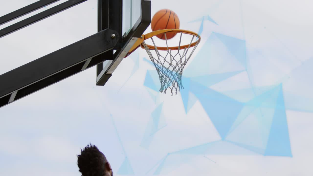 Lime player driving layup to score, defender jumping, ball arcing through hoop against blue overlay