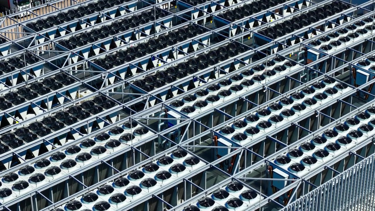 Cinematic drone view of cooling systems powering AI, cloud and digital services