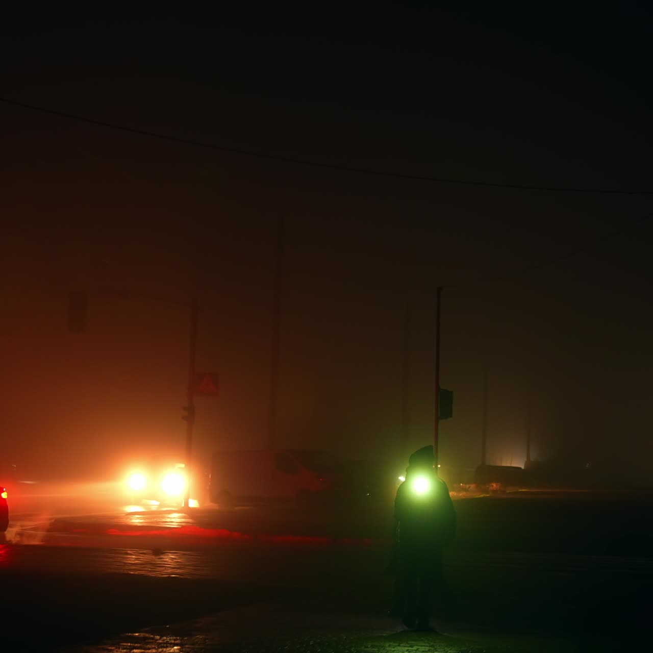 People walk with their flashlights on in the period of electricity outage in Ukraine. Cities in darkness from russian terroristic bombing attacks