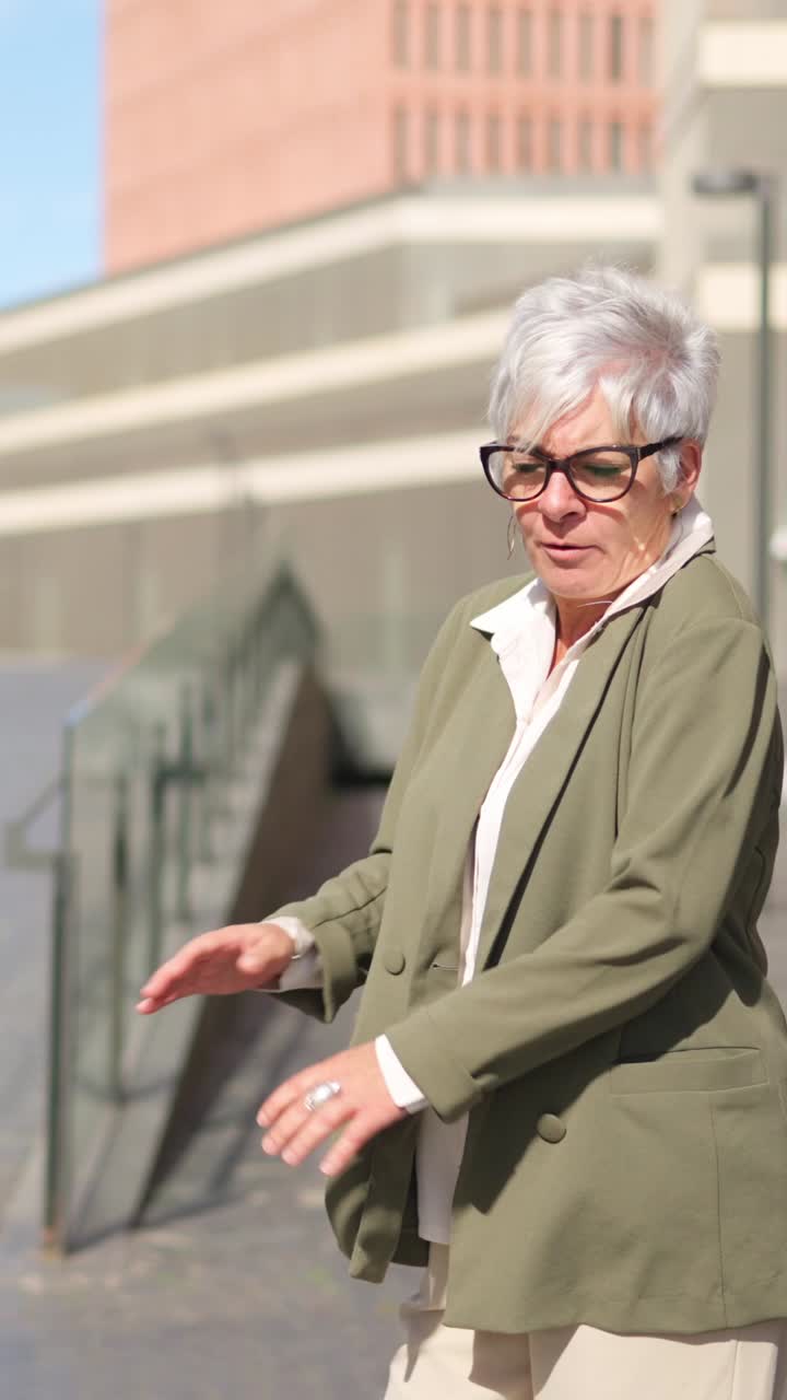 Portraits of a middle-aged businesswoman in an urban setting