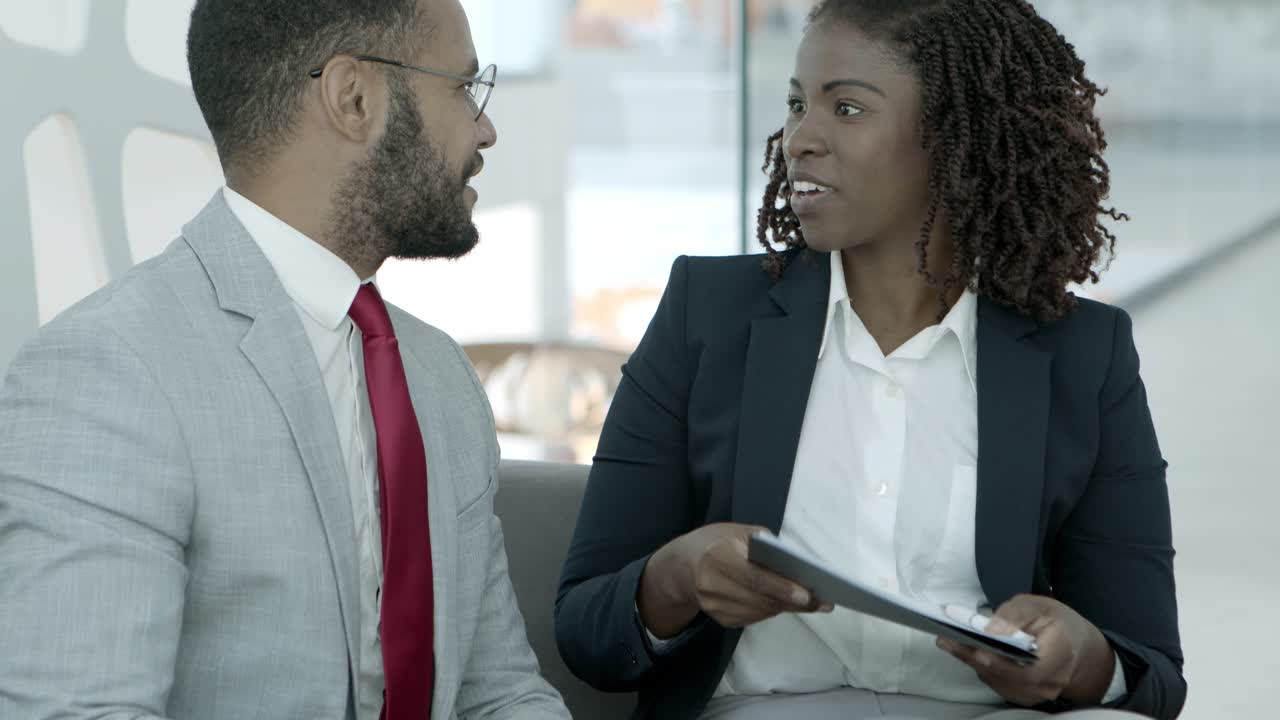 Business colleagues shaking hands
