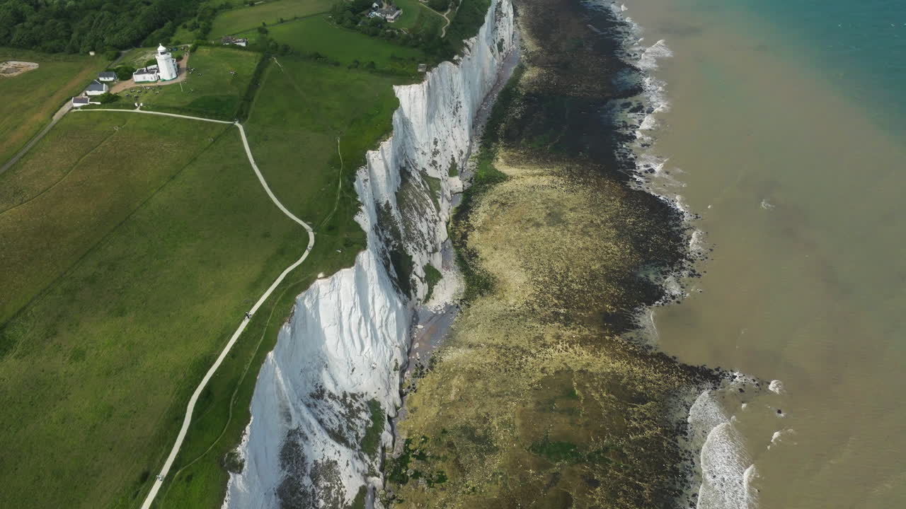 National Trust South Foreland Lighthouse And White Cliffs Of Dover By The Strait Of Dover In Kent, England, UK. - aerial shot