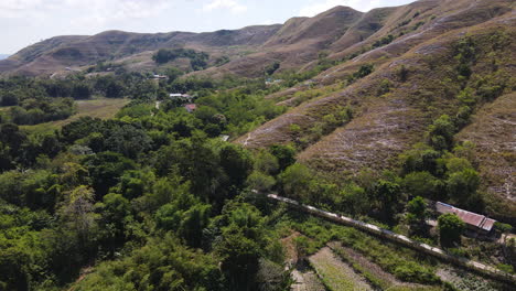 mountainous landscape with tropical forest in the island of sumba in east nusa tenggara, indonesia