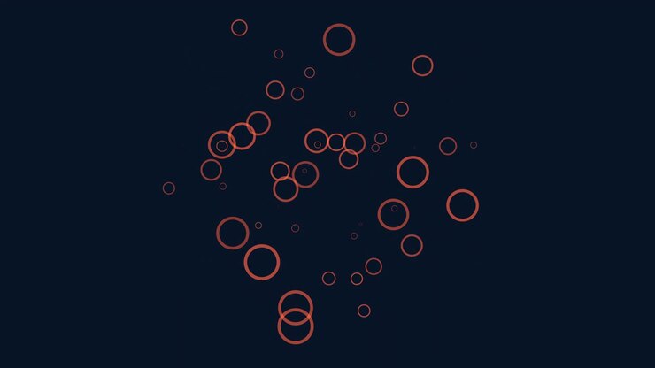 Una disposizione di cerchi sovrapposti a spirale su sfondo scuro, che crea una composizione visivamente accattivante e dinamica, con dimensioni variabili che danno un senso di profondità e movimento