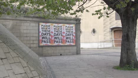message of hope during pandemic hard times in edinburgh centre, please believe