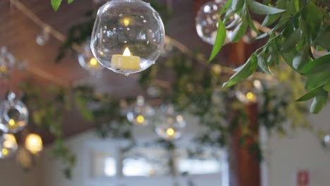 lightbulbs hang from ceiling at wedding reception