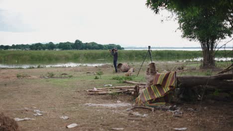 photographer by the river