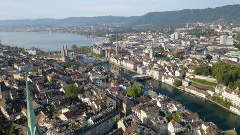 amazing aerial establishing shot of all four churches in zurich's old town