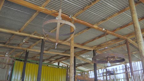 Unique-light-fixtures-of-iron-in-farm-stall-shed