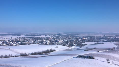 Weinvierte,-Wine-Quarter-And-Snow-covered-Vineyards-At-Winter-In-Zistersdorf,-Lower-Austria