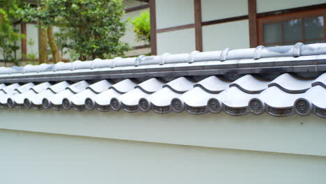 Smooth-shot-of-the-traditional-Japanese-rooftop-palets-in-Kyoto,-Japan-soft-lighting