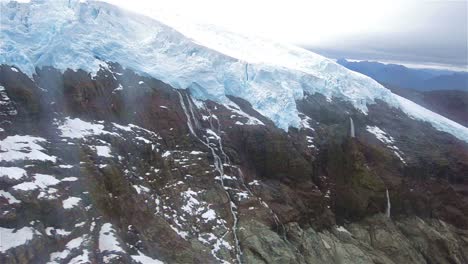 aerial from a helicopter of monte melimoyu glacier in southern chile