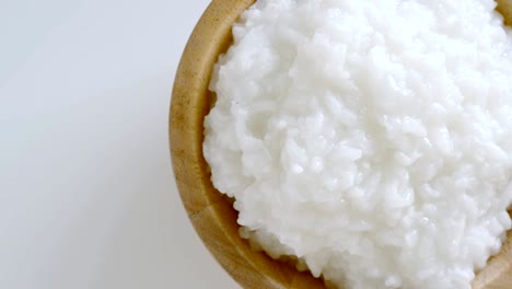 rice gruel or rice porridge in a wooden bowl.