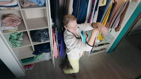 woman organizing her closet