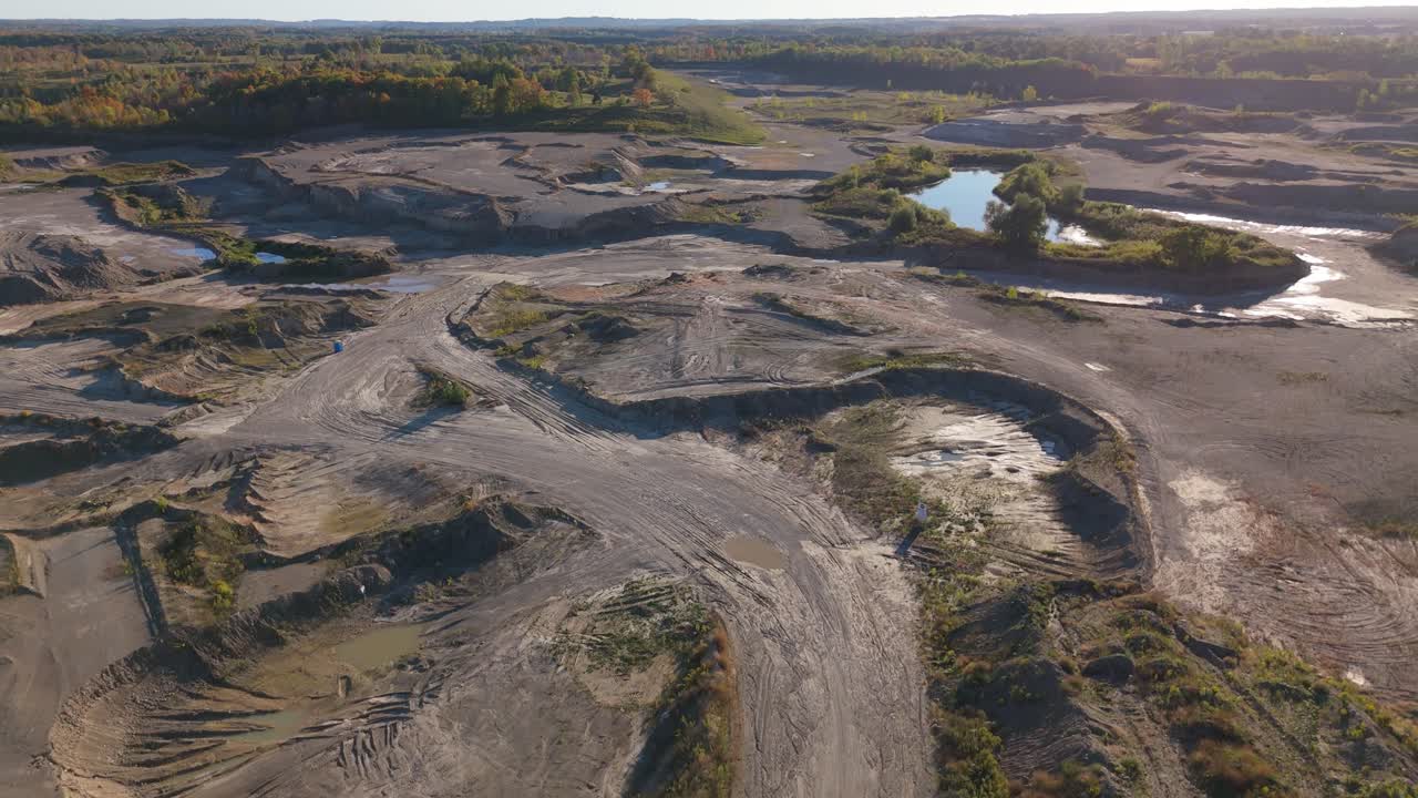 Aerial view of gravel pit near Caledon, Ontario, showing rugged terrain