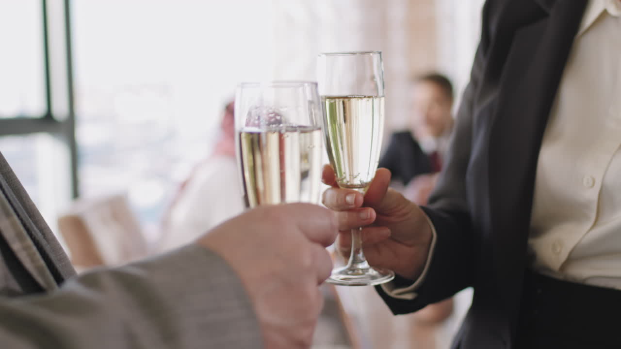 Business Partners Toasting Champagne Glasses