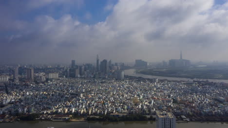 an early morning time lapse vietnam with fast moving clouds and view of the city skyline