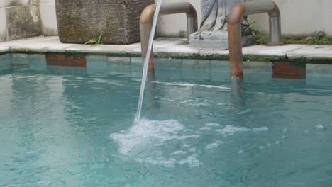 Footage-of-a-pool-fountain-sculpture-in-Bali