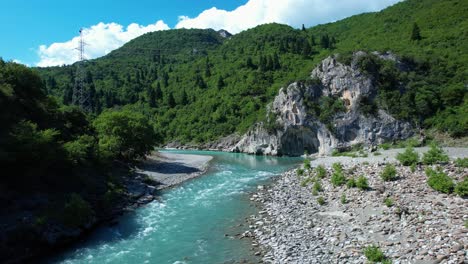 vjosa river turquoise wild waters carving rocky cliffs in pristine untamed albanian nature landscape
