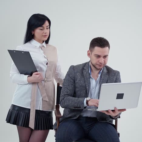 . business couple in studio. portrait of caucasian business couple cooperating