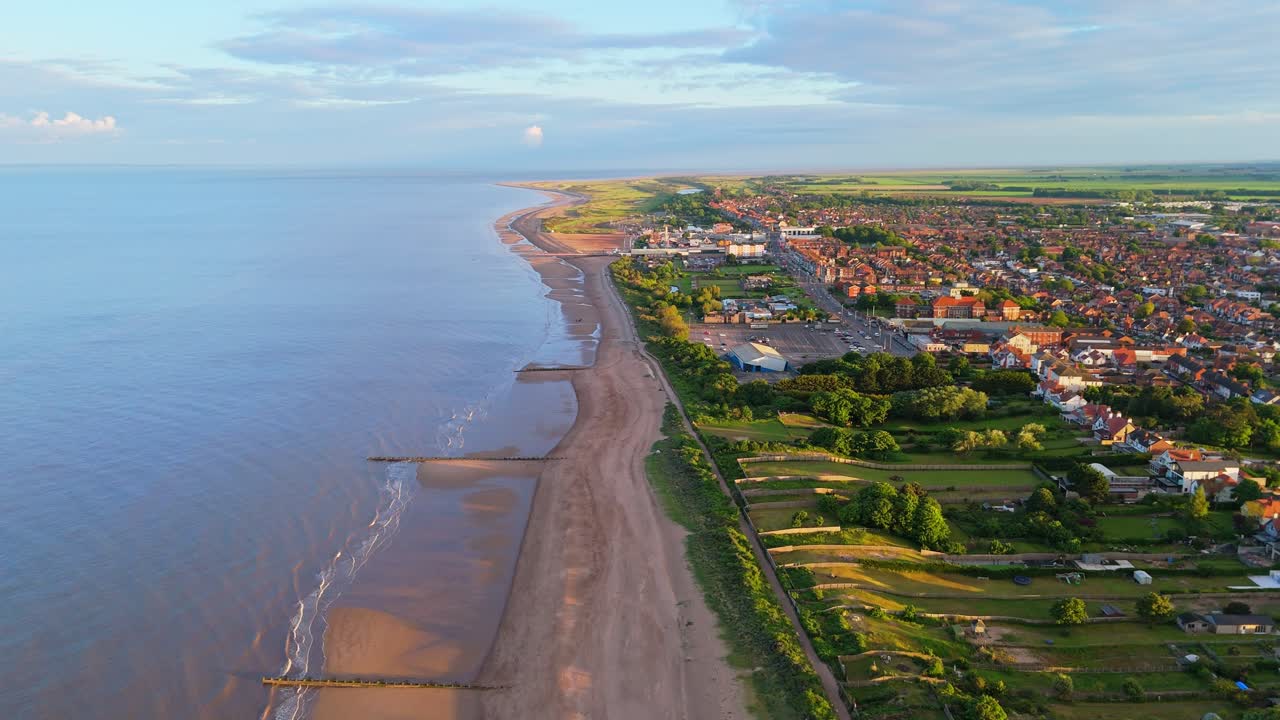 Aerial view of a coastal town and beach
