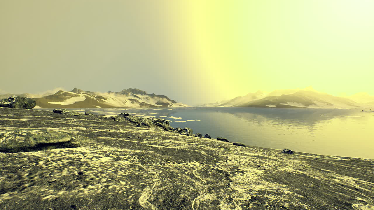 Majestic landscape of icy mountains under a vibrant yellow sky