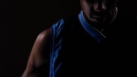 close-up of sportsman holding basketball