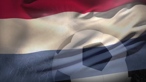 animation of flag of netherlands over football on stadium