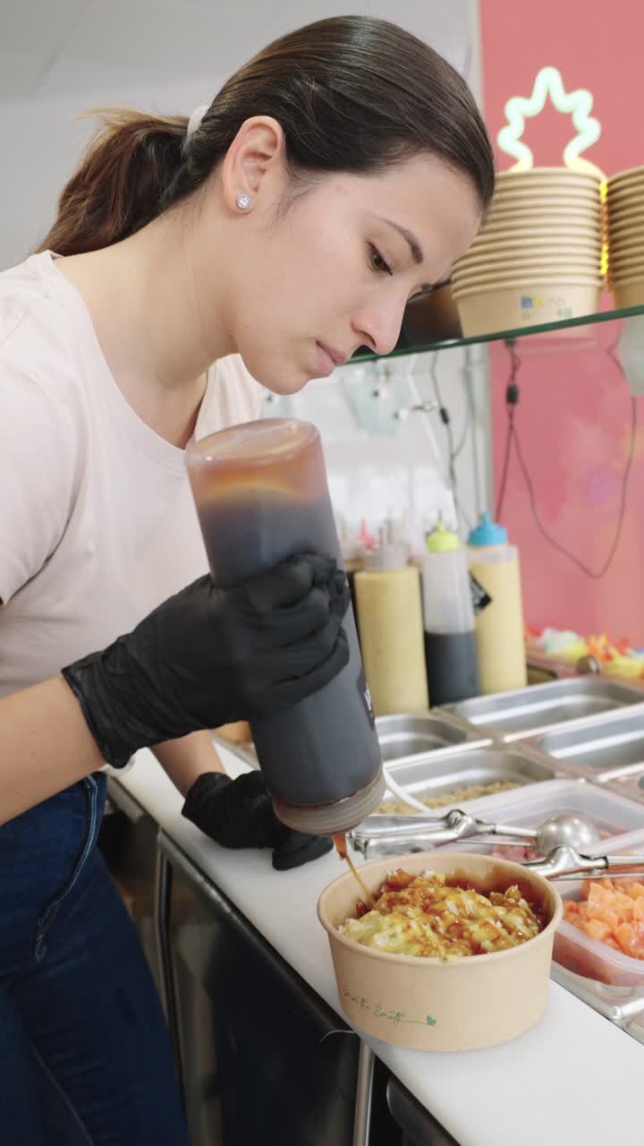 Woman preparing food in bowl