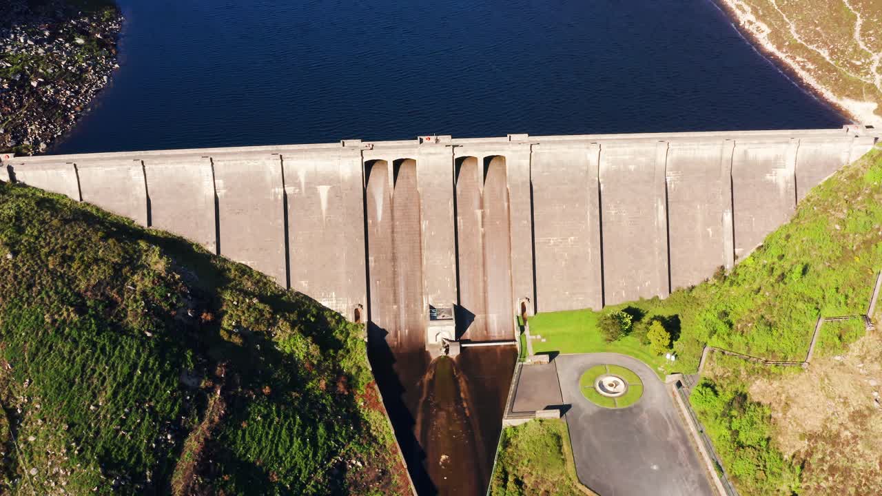 Orbiting Aerial View of Ben Crom Reservoir Nestled in the Mourne Mountains of Northern Ireland