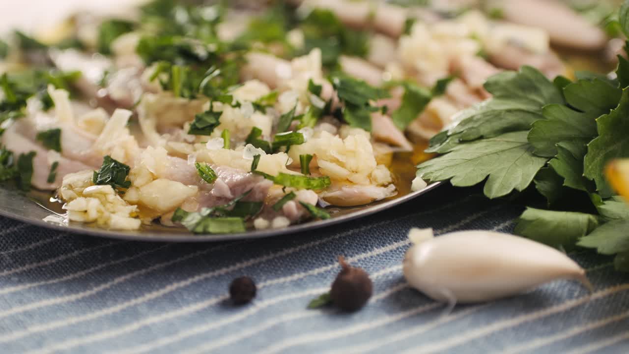 Fresh Sea sardines and Anchovy Fish and Mullus On Display On Ice On Market Store Shop. Seafood Fish Background, close up stand of small salty white fish.