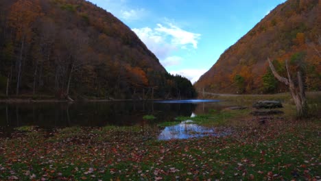 Clouds-Timelapse-between-a-deep,-beautiful-valley-in-autumn,-with-a-small-pond-in-the-Catskill-Mountains