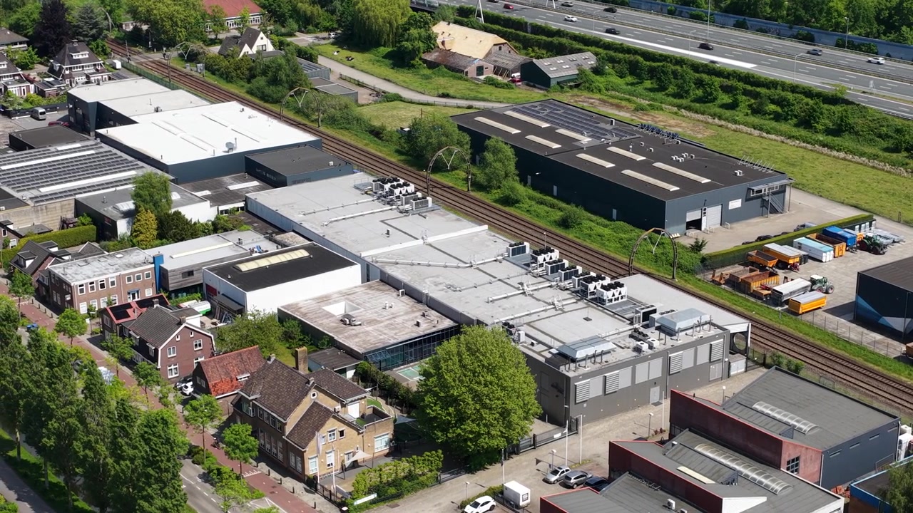 Aerial drone video of a commercial data center, showing big data operations, colocation services, cloud infrastructure, server facilities, and digital technology.