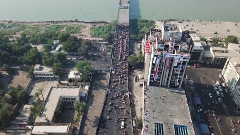 Mass-demonstrations-in-Iraq,-Baghdad,-filmed-by-a-drone