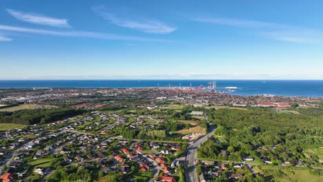 on a sunny evening, a panoramic view of frederikshavn, denmark