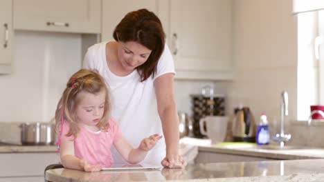 mother and daughter washing up