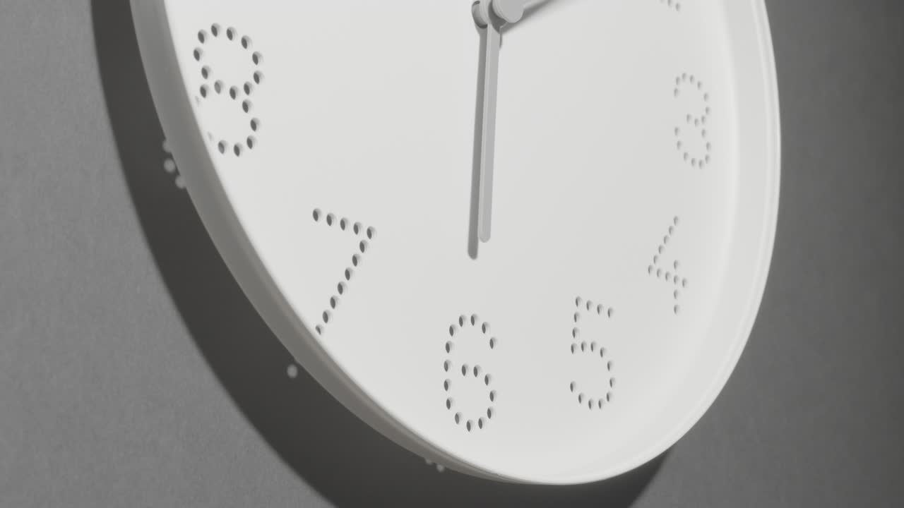 Dotted White Clock Face on Grey Wall All Day