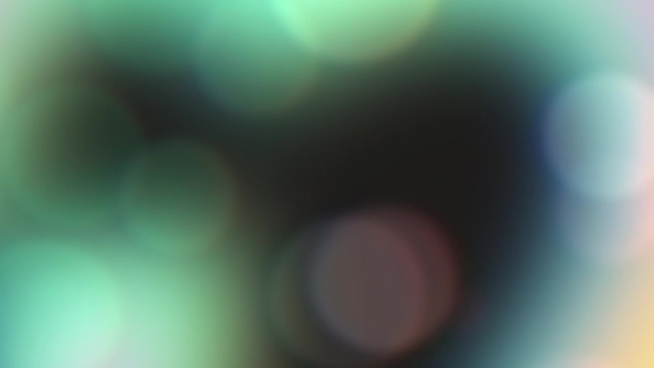 Abstract Background with Soft Glowing Colorful Bokeh Lights