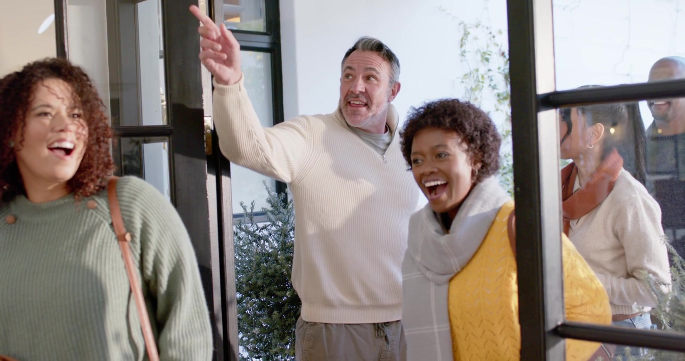 Group of Friends Arriving at a Vacation Rental Home