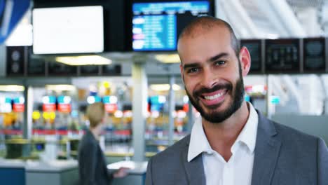 Businessman-looking-at-his-passport