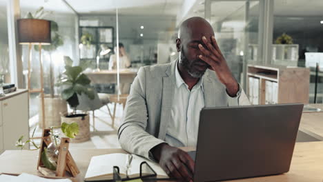 black man, business and headache at laptop
