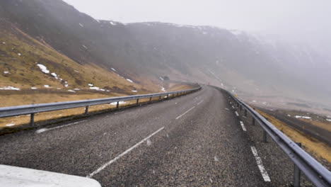 scenic snow on empty road in iceland slow motion