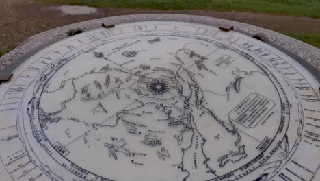 Map-on-top-of-Trig-Point-at-summit-of-Malvern-Hills,-overlooking-Malvern-town