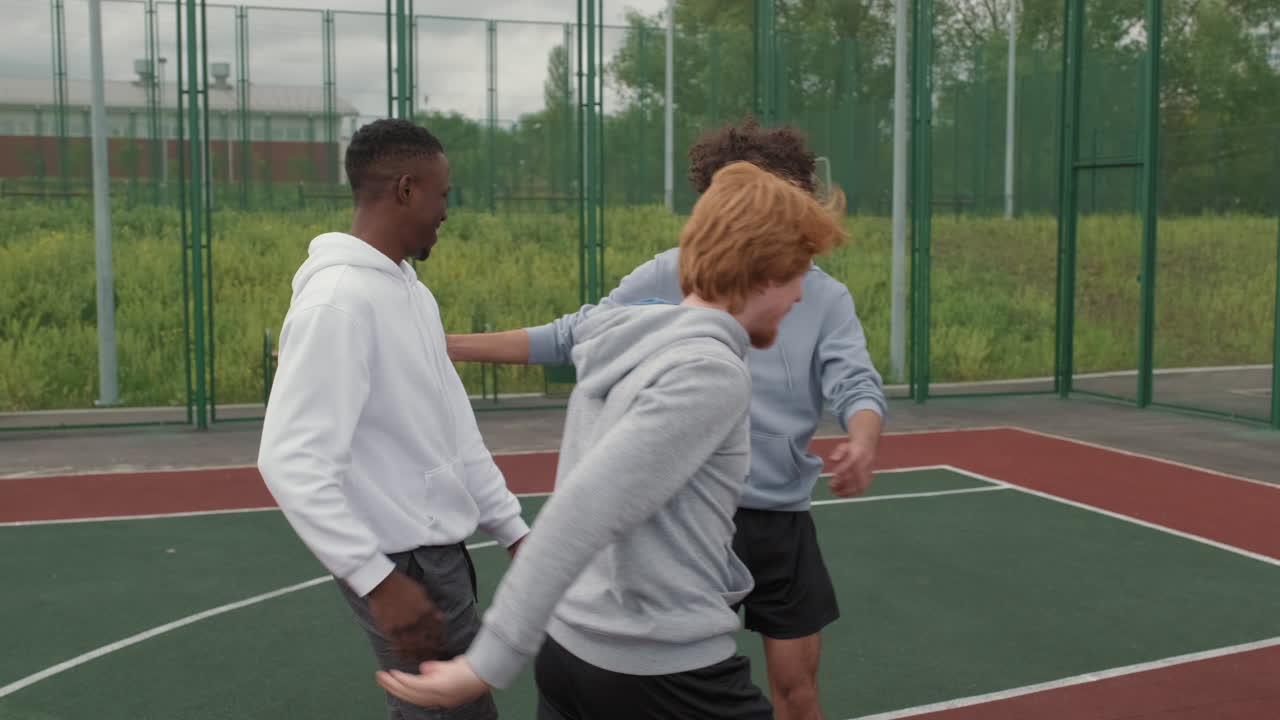 Man Making Basket during Friendly Streetball Game
