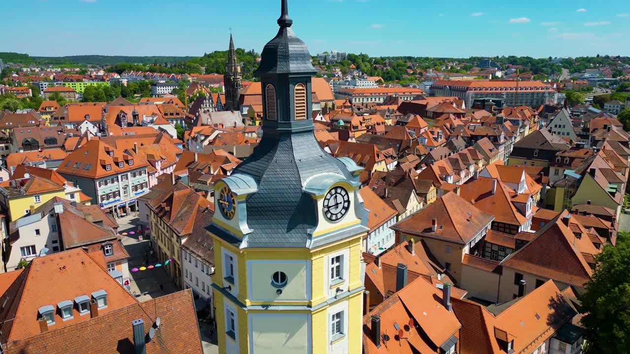 4K Aerial Drone Video of the Historic Herrieder Clock Tower in the Old Town area of Downtown Ansbach, Germany