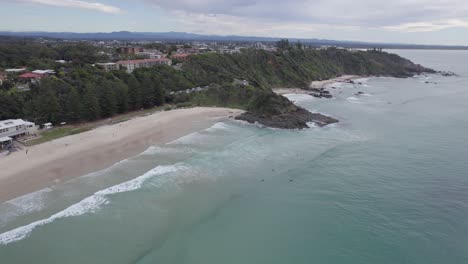 Aerial-View-Of-Beachfront-Cafe-In-Flynns-Beach,-NSW,-Australia