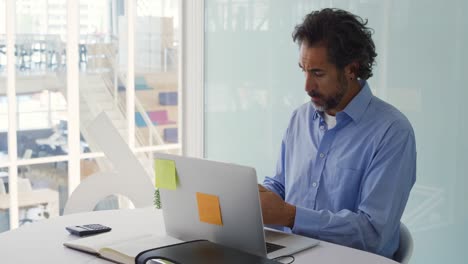 male creative professional working in an office