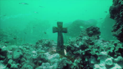 underwater scene with cross and fish