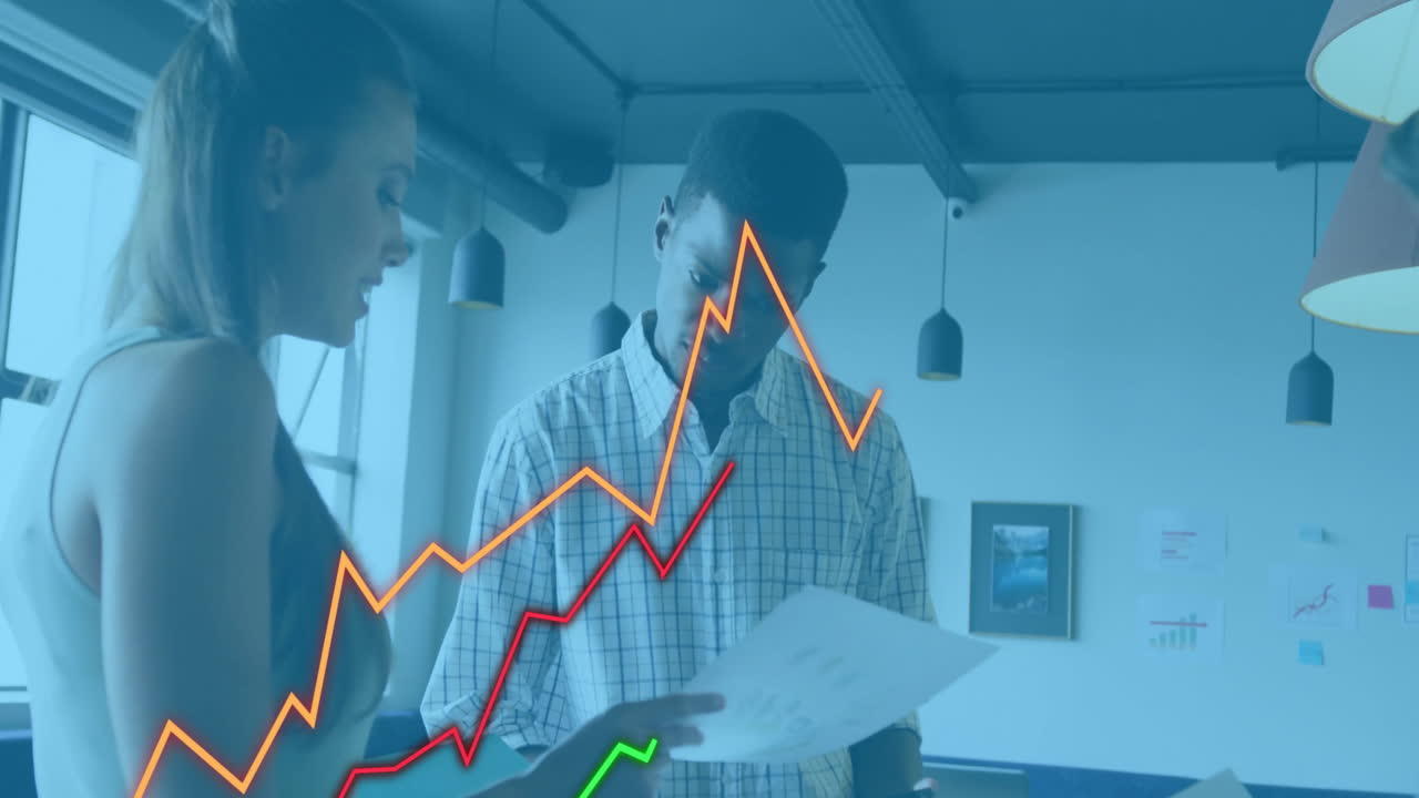 Animation of financial data processing over diverse colleagues discussing work in office