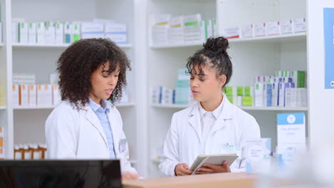 professional young pharmacists doing stocktake